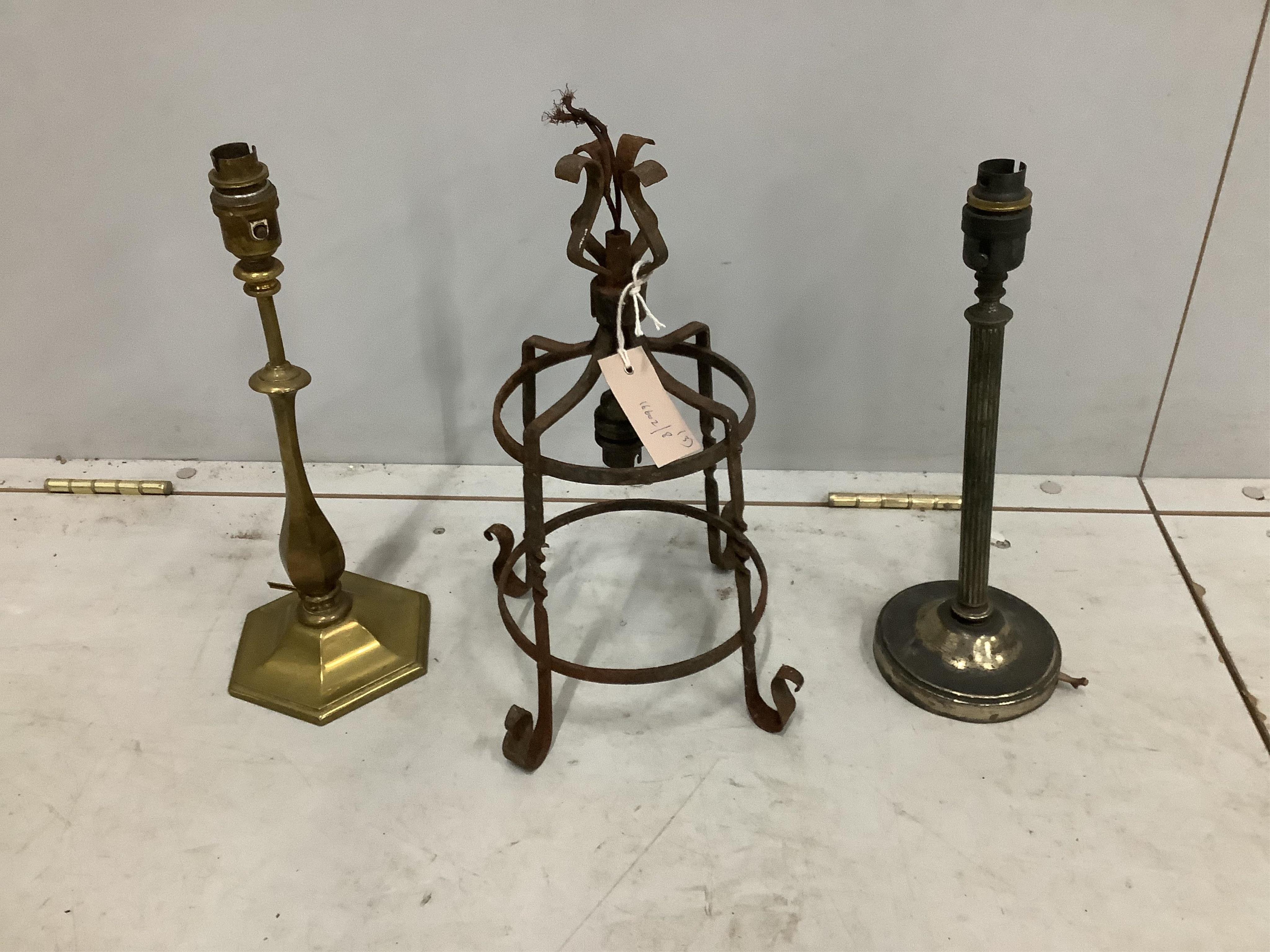 A wrought iron lantern and two candlestick table lamps, largest height 38cm. Condition - poor to fair